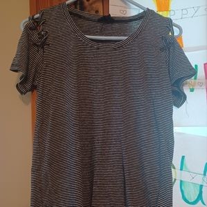 Black pin stripe tee shirt.